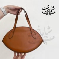 تصویر رو کیف دستی هلالی زنانه رنگ عسلی